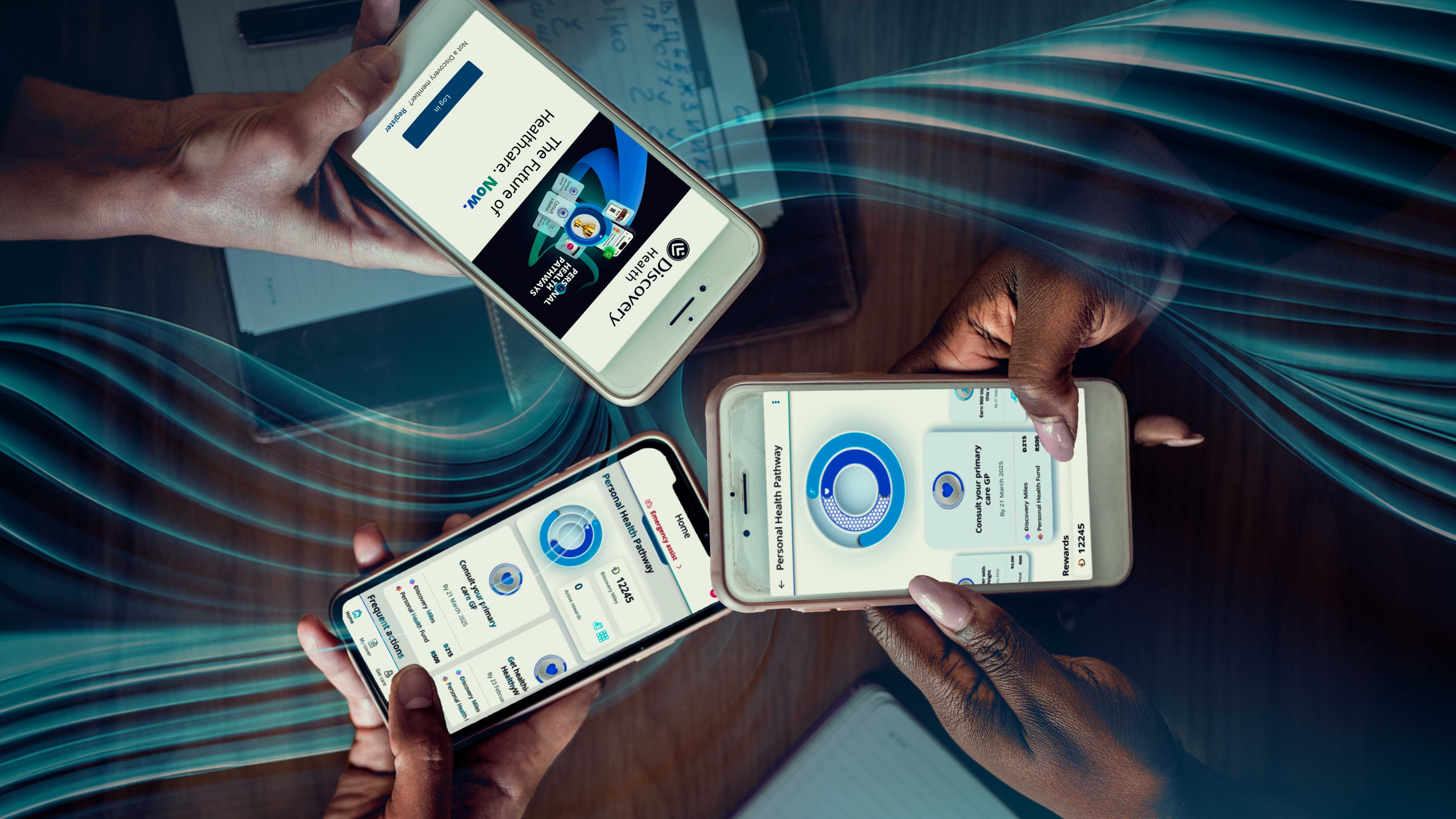 3 people holding cellphones with the Discovery app displaying