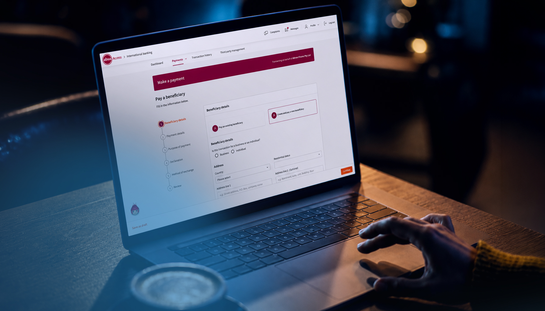 A person using the absa banking app 