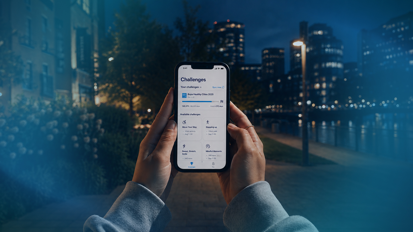 A person holding a phone on Bupa app 