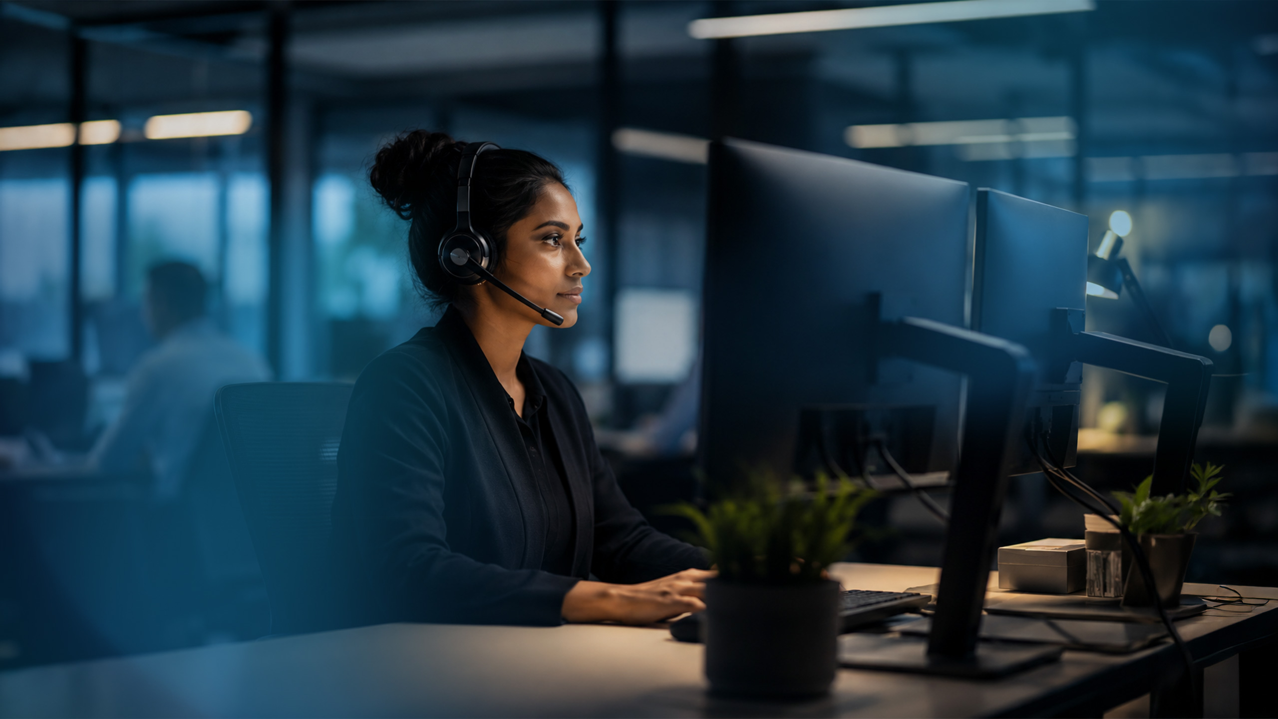 A Lady working at a computer 